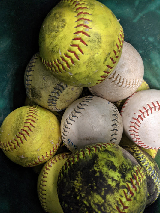 Softballs, Assortment vary, Used.  One Piece.